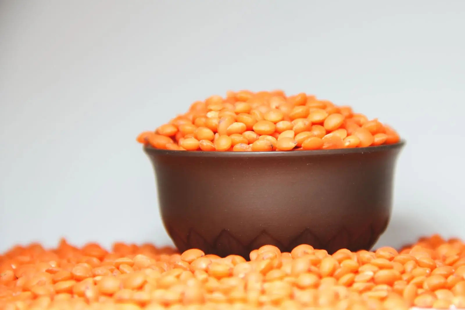 Bowl of red lentils, a plant source of iron