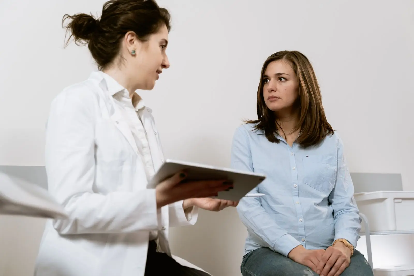 Doctor discussing delivery options with a pregnant patient